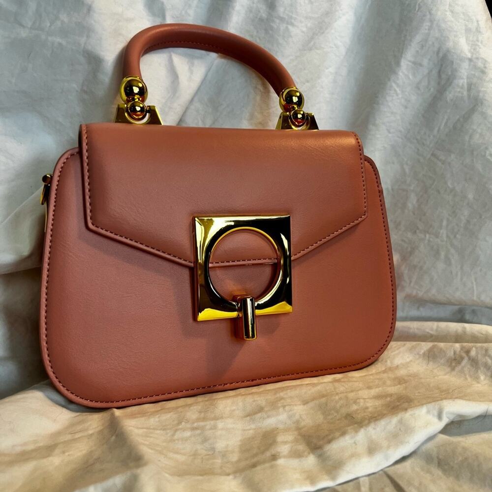 Elegant Pink Handbag with Gold Accents